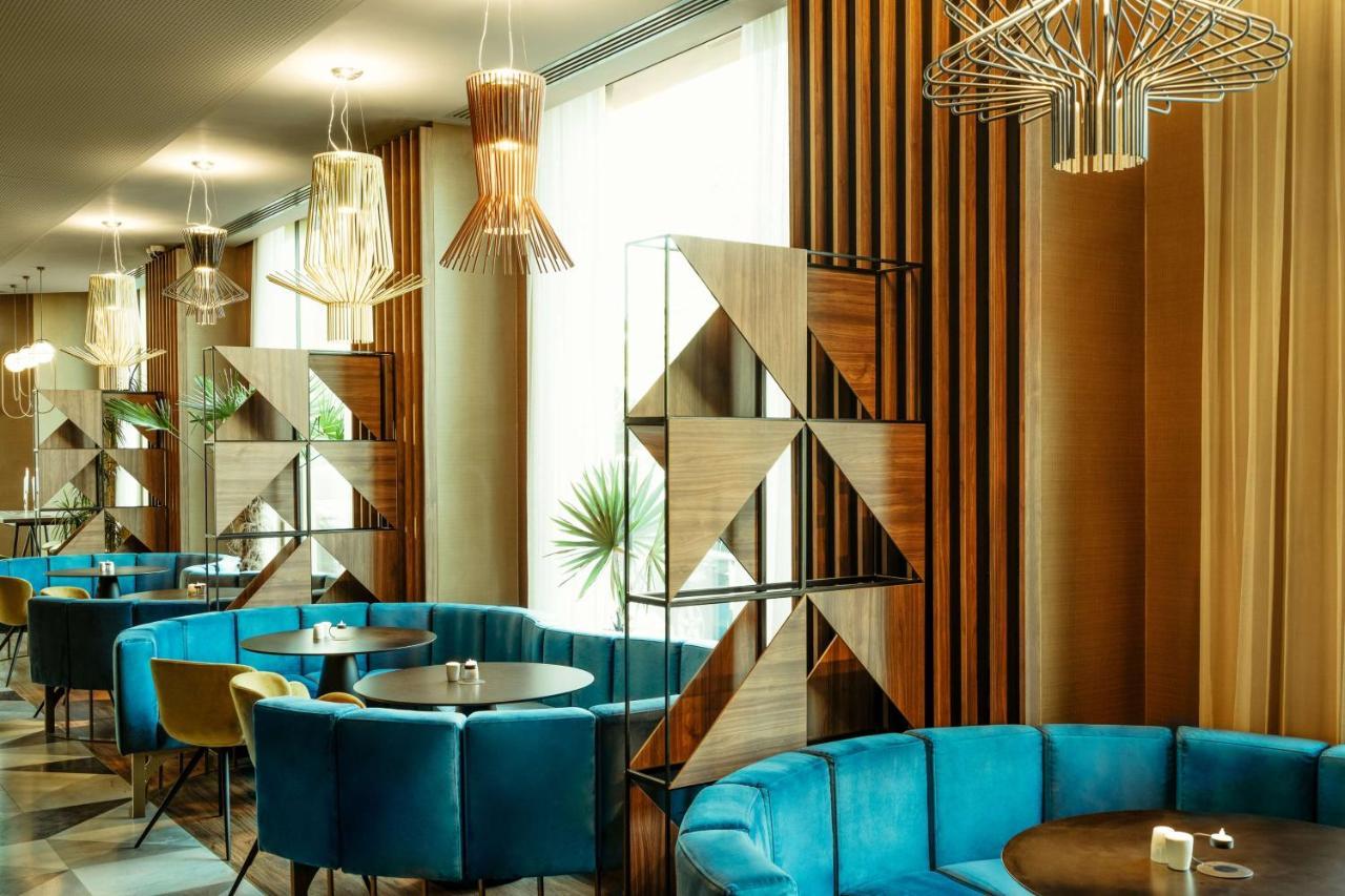 Radisson Blu Aurum Hotel, Braszów Zewnętrze zdjęcie The interior of the restaurant